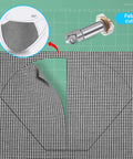 Front view: rotary blade drive housing for Maker 3/4; gear and blade visible, cutting houndstooth fabric on green mat