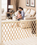 Expansion Walk Thru Room Divider Baby Gate in Natural Wood fits openings from 24 to 60 inches wide, stands 32 inches tall, in living room