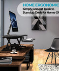 PowerPro 36 Inch Electric Standing Desk Converter for Sit to Stand with dual monitor setup in a modern home office