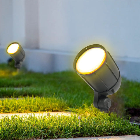 12W Bronze Outdoor LED Flood Light With Weatherproof Build Adjustable Mount Beefy Energy Efficient Bullet Flood on grass