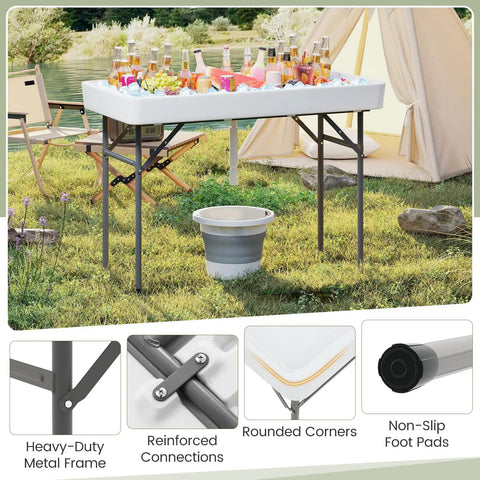 Portable Folding Ice Cooler Table With Drain And Satin Skirt Matching Foldable Bucket Bev Station For Parties Picnics And Camping Four Foot Party Ready Ice Table in outdoor setting with beverages.
