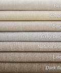 Stack of linen fabric samples in neutral colors labeled Birch, Cream, Beige, Grey Beige, Natural Linen, Linen, Dark Flax