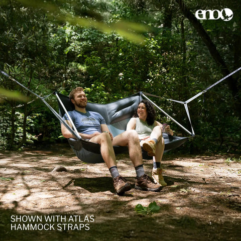 DoubleLoft Hammock Chair for Two Cozy and Comfortable With Cushioned Arm and Leg Rests, Side By Side Seating, in forest setup