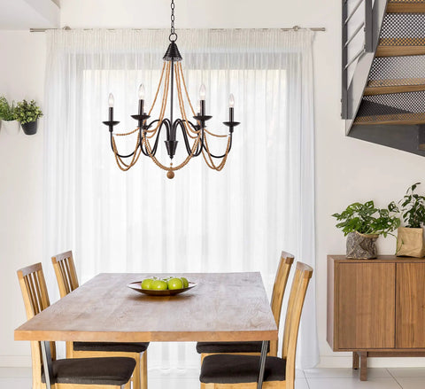 Escapade Six Light Chandelier In Oil Rubbed Bronze With Wood Bead Accents For Casual Dining Rooms Elegant Curves And Lit Ambient Lighting In A Modern Farmhouse Vibe above dining table