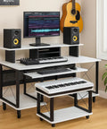 72 Inch Music Desk Workstation With Crossed Metal Panels Keyboard Tray White Finish Wide Monitor Surface Central Shelf Earphone Hook And Cable Cutouts For Mess-Free Home Recording Studio setup in a room.