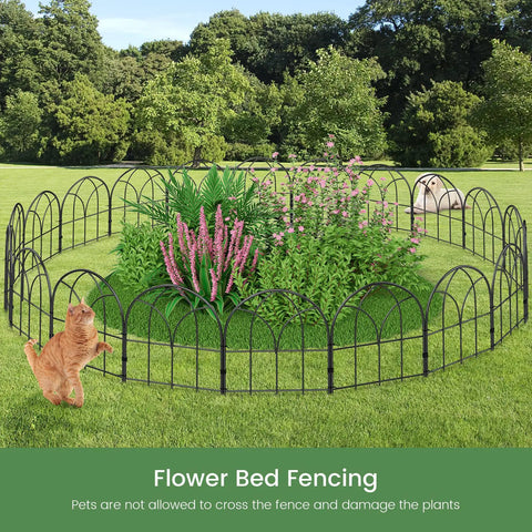 No Dig Black Metal Garden Fence Panels Six Pack Decorative Border installed around a flower bed with plants and a cat nearby.