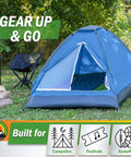 Two Person Camping Tent With Rain Fly And Carry Bag Ultralight Pop Up Shelter For Camping Essentials Music Festivals Beach Trips Backpacking And Hiking setup on grass with trees in background.