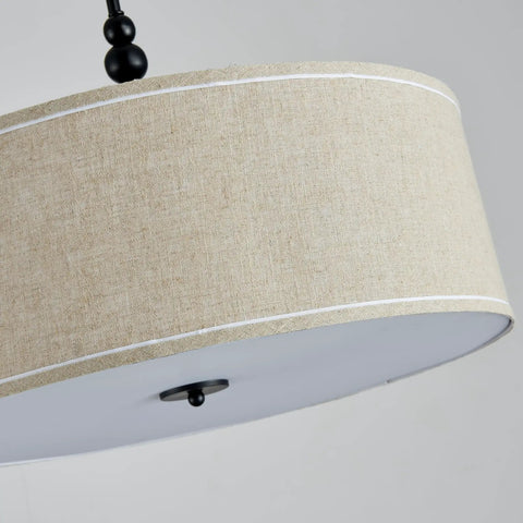 Close-up of beige drum shade and black rod on Beige Drum Pendant Chandelier For Dining Room, Farmhouse Style with White Linen Shade
