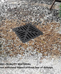 Catch Basin Kit 12x12 With Debris Basket And Grating Square Storm Drain Four Outlet Drainage Box placed in pebble surface