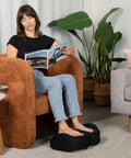 Person using Memory Foam Under Desk Foot Rest For Home Office And Gaming, Ergonomic Foot Stool Elevates Feet, Improves Posture And Circulation