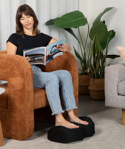 Person using Memory Foam Under Desk Foot Rest For Home Office And Gaming, Ergonomic Foot Stool Elevates Feet, Improves Posture And Circulation