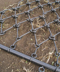 Heavy Duty Drag Harrow For ATVs And UTVs With A 4 Foot By 4 Foot Frame Seven Rows Of Sturdy One Half Inch Tines on soil