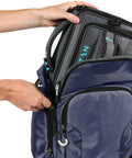Heavy Duty Expandable Lunch Pack With Dual Food Containers And Pro Grade Ice Walls For Hella Superior Cooling And Zero Leak Stress In Smooth Black And Blue Travel Bag, person unzipping compartment.