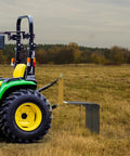 72 Inch Tow Behind Landscape Rake with 32 Steel Tine Dethatcher for Category 1 Tractors in use on grassy field