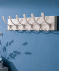 Wooden Wall Coat Rack With Six Hooks White Finish Modern Space Saving Wall Hanger on blue wall background