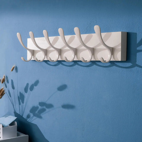 Wooden Wall Coat Rack With Six Hooks White Finish Modern Space Saving Wall Hanger on blue wall background