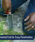 Pro Hori Hori Garden Knife 12 Inch Multipurpose Digging Tool in use showing 7 inch serrated alloy blade cutting roots