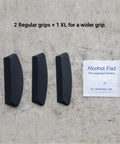 Three black Magic Grips for Apple Magic Mouse 1 and 2 with a cleaning alcohol pad for better control and smoother, relaxed handling.
