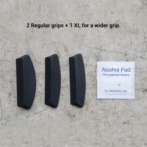 Three black Magic Grips for Apple Magic Mouse 1 and 2 with a cleaning alcohol pad for better control and smoother, relaxed handling.