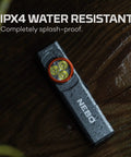 Slim Mini Rechargeable Pocket Light For EDC And Emergencies shown wet on wooden surface, demonstrating IPX4 water resistance