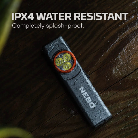 Slim Mini Rechargeable Pocket Light For EDC And Emergencies shown wet on wooden surface, demonstrating IPX4 water resistance