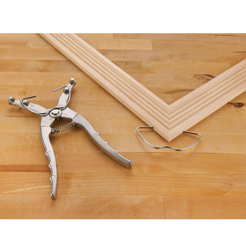 Spring Miter Clamp Set For Woodworking, 32 Clamp Pack With Spreader And Form Fitted Case, metal clamp and wood molding detail