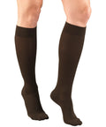 Women Knee High Compression Socks 15-20 MmHg Moderate Graduated Support Lightweight Breathable Rib Knit Dress Stockings In Brown shown on legs.