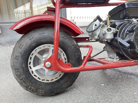 Side view of rear wheel and engine of mini bike compatible with 180mm Mini Bike Disc Brake Rotor With Pads Replacement For Baja Doodle Bug