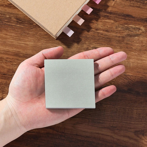 Hand holding a 3x3 inch pad from Sticky Notes Bulk Pack 3x3 Inches 12 Pads 600 Sheets Vintage Colors Self Stick Note Pads