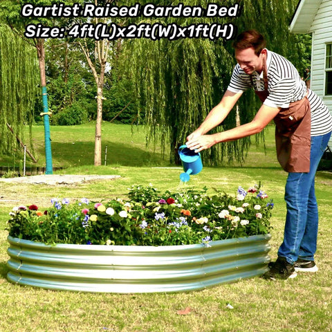 Man watering plants in Two Pack Raised Garden Bed For Outdoor Use Made From Galvanized Steel, Easy Tool Free Assembly, Planter Box For Veggies, Flowers And Herbs, Sturdy Rust Resistant Garden Bed 4 By 2 By 1 Feet installed in backyard