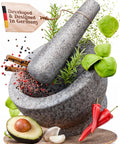 Unpolished Granite Mortar And Pestle Set One And A Half Cup Capacity with fresh herbs and spices around it