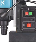 Makita HB350 magnetic drill; front panel with red power switch and green indicator, blue motor housing visible.