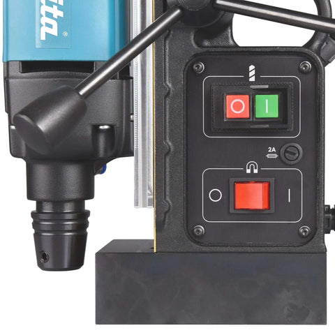 Makita HB350 magnetic drill; front panel with red power switch and green indicator, blue motor housing visible.
