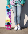 Person holding Kids Cruiser Skateboard With Printed Graphic Grip Tape, Smooth ABEC 5 Bearings, Durable Deck, Five Inch Aluminum Trucks