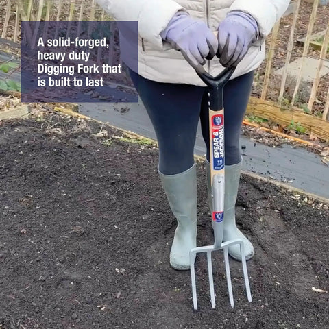 Neverbend Carbon Digging Fork for Heavy-Duty Yard Work in use, showcasing supergrip handle and carbon steel tines for tough soil.