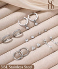 Lightweight Hypoallergenic Silver Earring Stacks For Women 7 Pair Set, 316L stainless steel hoops and CZ studs on display