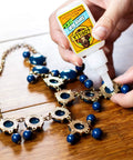 Applying Clear Gel Super Glue For All Purpose Bonding Fast Setting And No Run Formula Great For Glass Plastic Wood Ceramic And More Ideal For DIY Projects And Household Repairs 20 Gram Pack to a necklace.