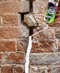 Top Shelf Gaps And Cracks Filler Foam Heavyweight Polyurethane Expanding Sealant For Insulating Doors And Windows Waterproof Paintable Straw Tip 12 Oz Two Pack No Sweat Diy Job applied to a brick wall crack.