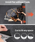 Heavy Duty Waterproof Garage Floor Mat 8 Foot 10 Inch By 22 Foot With Non Slip TPE Backing being unrolled and cut to fit