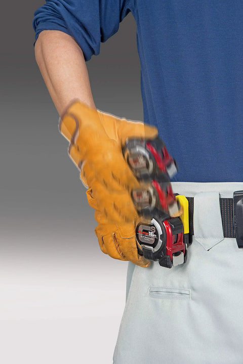 Worker using Tape Measure 16ft 5m 1 Inch GS Lock with Acrylic Coated Blade Quick Fit Belt Clip for easy one hand use on site