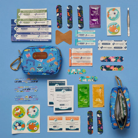 KeepGoing Kids Travel First Aid Kit blue fabric pouch; compact 4.5 x 3.5 x 2 in with 60 pieces and latex-free bandages