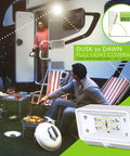 Rugged 12V LED RV Exterior Porch Light With Switch illuminating a campsite setup with chairs and a grill.
