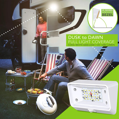 Rugged 12V LED RV Exterior Porch Light With Switch illuminating a campsite setup with chairs and a grill.