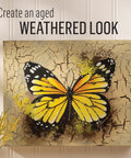 Heavy Duty Crack Finish Medium creating a sick distressed look on a butterfly painting with realistic cracks.