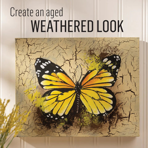 Heavy Duty Crack Finish Medium creating a sick distressed look on a butterfly painting with realistic cracks.
