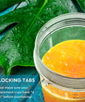 Close-up of 24oz Smoothie Blender Cup with Sip and Seal Lid showing orange smoothie and 4 locking tabs for leakproof secure use.