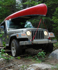 Heavy Duty Ratchet Straps That Mean Business With 1500 Lbs Working Load And 4500 Lbs Break Strength Rubber Coated Double J Hooks Ergonomic Ratchet Handle Tie Down Straps Includes 4 Soft Loops And Carry Bag securing red canoe on Jeep