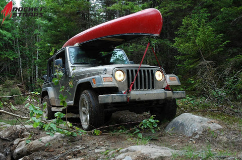 Heavy Duty Ratchet Straps That Mean Business With 1500 Lbs Working Load And 4500 Lbs Break Strength Rubber Coated Double J Hooks Ergonomic Ratchet Handle Tie Down Straps Includes 4 Soft Loops And Carry Bag securing red canoe on Jeep