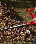 Person using Three In One Leaf Blower Vacuum With Metal Impeller And Infinite Variable Speed Up To Two Hundred Thirty Five MPH 12 Amp Power