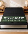 Queen Size Bunkie Board 60x80 Heavy Duty Mattress Support displayed on a bed frame in a cozy room setting.